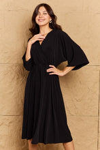 Load image into Gallery viewer, OneTheLand Make Your Move Solid Surplice Midi Dress