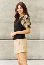 Load image into Gallery viewer, And The Why Hold Me Close Floral Print Textured Sleeve Knit Top